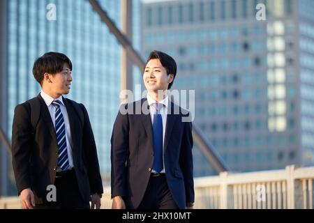 Japanese Businessmen Chatting Stock Photo