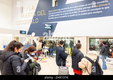 Travelers queueing up for the board pass check for Madrid Iberia flight in departure terminal in San Pablo Seville Airport, SVQ, Andalucia, Spain Stock Photo