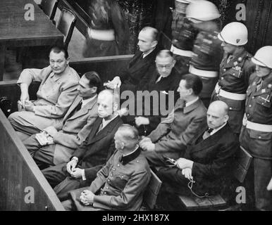 Nuremberg Trials. Defendants in their dock, circa 1945-1946. (in front row, from left to right): Hermann Göring, Rudolf Heß, Joachim von Ribbentrop, Wilhelm Keitel (in second row, from left to right): Karl Dönitz, Erich Raeder, Baldur von Schirach, Fritz Sauckel Stock Photo