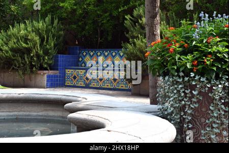 Colorful Spanish Garden Bench in Late summer on the rio Grande Valley in New Mexico. Stock Photo