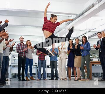 Work hard and have fun. Cropped shot of an office party with people dancing and having a good time. Stock Photo