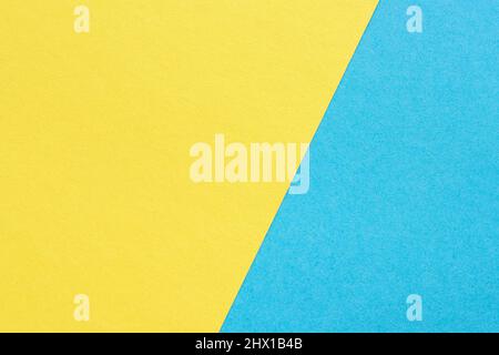texture heavy paper, abstract yellow and blue background, divided diagonally Stock Photo