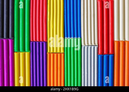 multicolored plasticine background, texture. Plasticine for modeling and development of imagination, fine motor skills. Stock Photo
