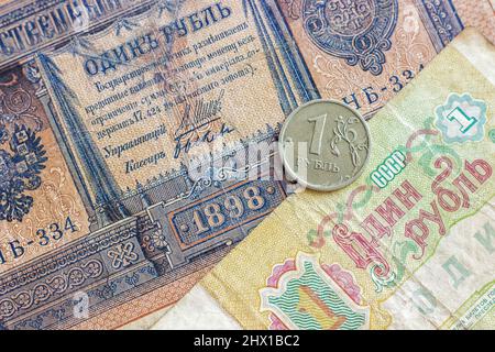 Comparison of Russian money denominated in 1 (one) ruble. Period of the Russian Empire, the USSR (former Soviet Union) and the Russian Federation. Stock Photo