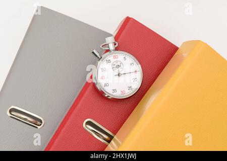 Yellow, red  and gray office folders on the white background. Stock Photo