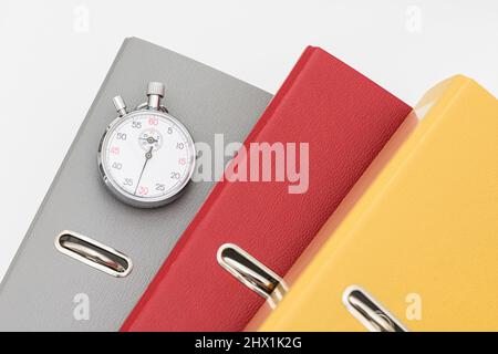 Yellow, red  and gray office folders on the white background. Stock Photo