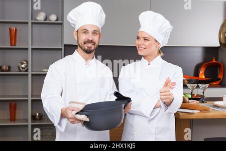Two confident chefs Stock Photo
