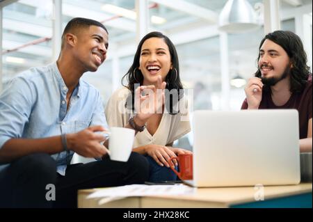 Working with every exceptional idea of theirs. Shot of a group of businesspeople having a discussion in an office. Stock Photo