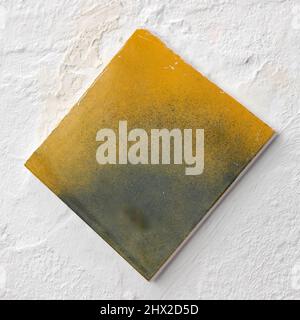 White wall with Two toned spray painted tile in Andalusian patio Stock Photo