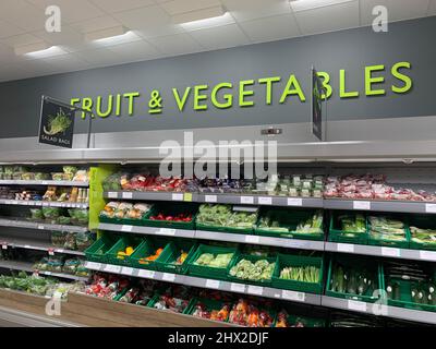 Fruit and Vegetables at Waitrose Rushden Lakes Northamptonshire UK store design stack stacked shelves shelving smart perfect edible grown local Stock Photo