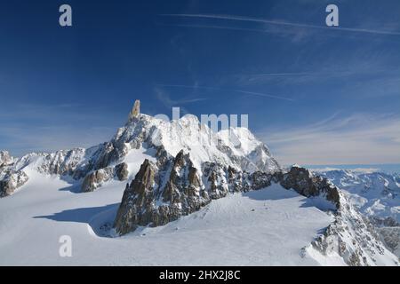 Winter alps mountains and blue sky. View from Punta Helbronner, italian viewpoint on Mont Blanc, the highest mountain in the Alps Stock Photo