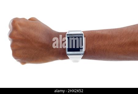 Cropped view of a woman wearing a smartwatch. The commercial product(s) or designs displayed in this image represent simulations of a real product Stock Photo
