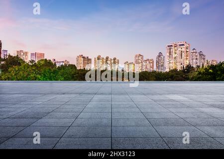 Modern city skyline with empty floors in Shenzhen at night, China. Stock Photo