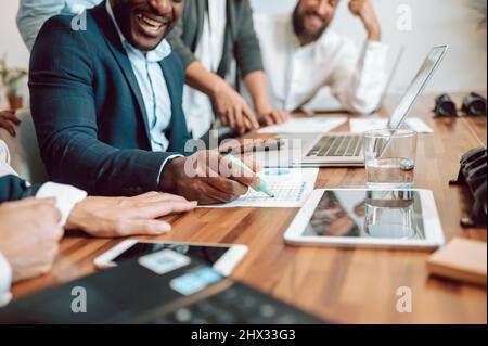 Unrecognizable colleagues working with documents Stock Photo