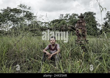 Crude oil, pollution, Ecuador, Texaco, Chevron, sick people, environment Stock Photo