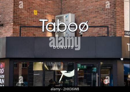 Belfast, UK- Feb 19, 2022: The sign for Bogart donut store in Belfast Northern Ireland. Stock Photo
