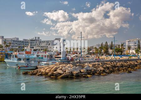 Ayia Napa, Cyprus - May 23, 2021: Boats and ships moored in seaport. Ayia Napa is a tourist resort at the far eastern end of the southern coast of Cyp Stock Photo