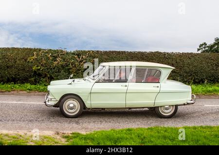 1965 60s sixties Cream Citroen AMI 802cc petrol model with 5-door station wagon body; en-route to Leighton Hall classic August car show Carnforth, UK Stock Photo