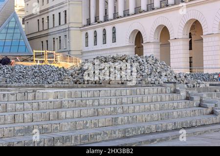 Broken paving stones in the town square Stock Photo