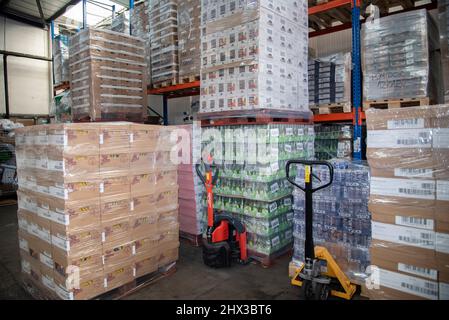 London, UK. 09th Mar, 2022. Inside the Polish food distribution warehouse housing donations for Ukrainian refugees in Croydon in London, UK on 9 March 2022. The donations are loaded on to pallets and delivered by lorry to Poland. (Photo by Claire Doherty/Sipa USA) Credit: Sipa USA/Alamy Live News Stock Photo