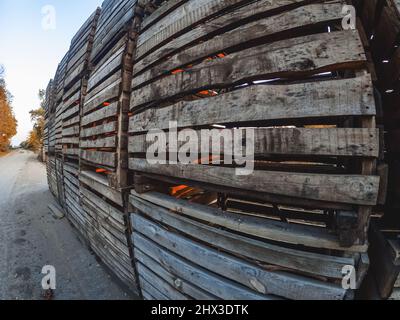 Wooden fence. Wooden boards, beaten horizontally. Wooden boxes. Abstract background Stock Photo