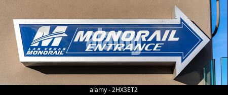 Las Vegas, NV - December 15, 2021: Las Vegas Monorail entrance sign with arrow and logo. The Monorail is a 3.9 mile mass transit system located adjace Stock Photo