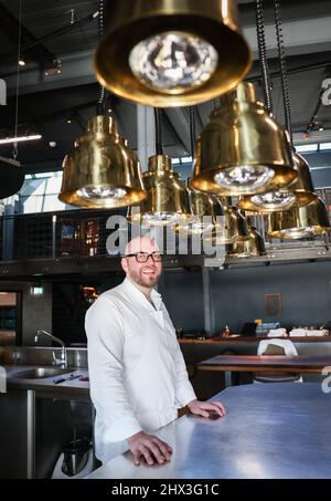 Hamburg, Germany. 09th Mar, 2022. The new two-star chef Thomas Imbusch of the Hamburg restaurant "100/200 Kitchen" is in the kitchen of his restaurant after the award of the Michelin stars 2022 for German restaurants. The "Guide Michelin" presented the new Germany edition of its restaurant guide on Wednesday in Hamburg. The "100/200 Kitchen" received its second Michelin star. Credit: Christian Charisius/dpa/Alamy Live News Stock Photo