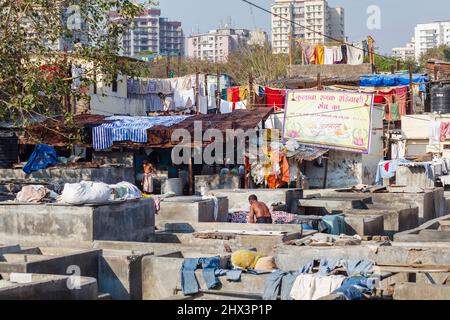 View of rows of concrete wash pens at Mahalaxmi Dhobi Ghat, a large open air laundromat in Mumbai, India Stock Photo