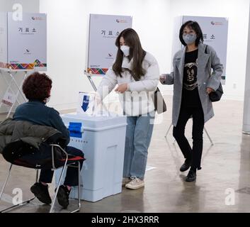 Seoul, South Korea. 09th Mar, 2022. People cast ballots for the presidential election at polling station in Seoul, South Korea on March 9, 2022. (Photo by Lee Young-ho/Sipa USA) Credit: Sipa USA/Alamy Live News Stock Photo