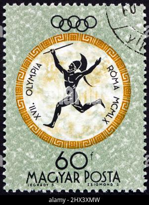 HUNGARY - CIRCA 1960: a stamp printed in Hungary shows jawelin thrower, 1960 Summer Olympics, Rome, circa 1960 Stock Photo