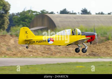 Fokker S.11 Instructor vintage, classic plane G-BEPV taking off after an airshow at RAF Bentwaters, Suffolk, UK, in 2010. Netherlands Navy trainer Stock Photo