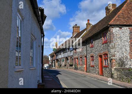 Alfriston East Sussex , England UK - Alfriston High Street with the historic George Inn , a Grade 2 listed building dating back to the 14th Century. Stock Photo