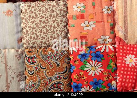 The patchwork quilt in market as background Stock Photo