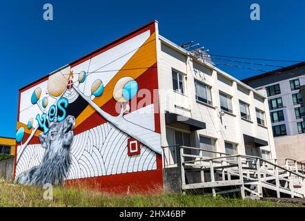mural in Tacoma Washington on the side of a large square white building Stock Photo
