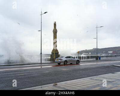 Stormy conditions with big waves overtopping the prom road in Douglas, Isle of Man Stock Photo
