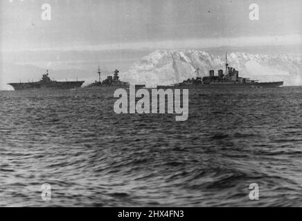 Photographs taken when our naval forces covered the passage of convoys through the mediterranean, which were carrying important and material assistance to Greece. Units of the floot soon off the Rock of Gibraltar. Showing the 'Ark Royal', battleship, and the 'Ronown.' February 2, 1941. (Photo by British Official Photograph). Stock Photo