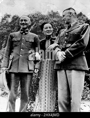Madame Chiang Kai-Shek links arms with her husband and American General Stilwell in Burma, 1944, not long after the stormy Cairo meeting. May 4, 1944. Stock Photo