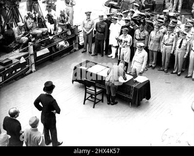 He was one of the back-row boys when General MacArthur ***** Allied Nations, accepted the Japanese surrender on USS *****. March 28, 1951. (Photo by Australian Official Photo). Stock Photo