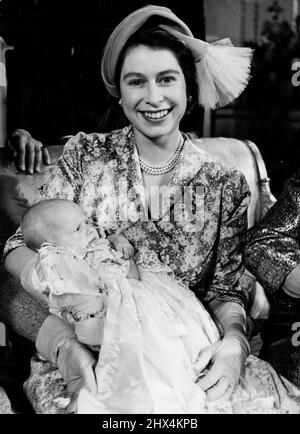 The Christening Of Princess Anne -- Princess Anne, the second child of H.R.H. Princess Elizabeth and the Duke of Edinburgh was christened at Buckingham Palace on October 21st, 1950, H.R.H. Princess Elizabeth holding Princess Anne who is wearing the famous Honiton Pace christening robe in which her brother and her mother were baptised. November 08, 1950. (Photo by Baron, Camera Press). Stock Photo