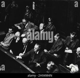 Nazi war chiefs face trial at Nuremberg -- Front row (Left to Right) Carl Krauch, Hermann Schmitz, Georg Von Schintzler, Fritz Gauewski, Hefrich Hoerlein, August Von Knieriem. Second row (Left to Right) Paul Haefliger, Max Ilgner, Friedrich Jaehne, Hans Kuehne and Carl Lautenschalecer. They are seen in the Nuremberg courtroom during the opening session of the trial on August 27.Twenty two leading officials of I.G. Farben, the German chemical cartel, are now on trial in the same courtroom at Nuremberg, Germany, where Goering and his associates were sentenced. September 7, 1947. (Photo by Associ Stock Photo