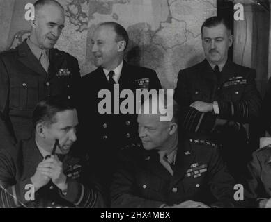 Allied Supreme Command In Conference - First Pictures -- General Dwight D. Eisenhower, Supreme Commander and Air Chief Marshal Sir Arthur Tedder, Deputy Supreme Commander, in conversation during the conference. For the first time the Allied Supreme Command were photographed in conference at their headquarters. February 1, 1944. (Photo by Plant News Ltd.). Stock Photo
