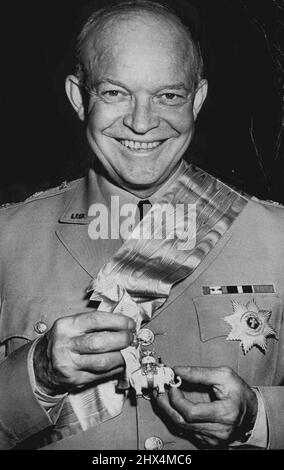 'Ike' Wears An Elephant -- Following presentation ceremonies tonight, Gen. Dwight D. Eisenhower exhibits an elephant - but it had nothing to do with the Republican party. It came in the form of Denmark's highest decoration, the Order of Knight of the Elephant, awarded to the U.S. Chief of Staff at a Danish Embassy Dinner. Embassy officials said the diamond encrusted medal, one of the oldest decorations in the world, is awarded only to princes of blood. October 29, 1947. (Photo by Associated Press Wirephoto). Stock Photo