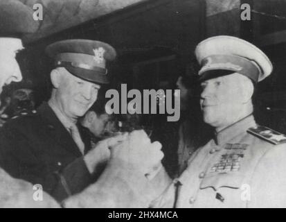 Allied Generals Offer Toast -- Offering a toast to the victory of the United Nations are, left to right: Field Marshall Bernard L. Montgomery; General Dwight D. Eisenhower, supreme commander of Allied Forces, and Marshal of the Soviet Army, Gregory Zhukov, at a ceremony during which Zhukov presented General Eisenhower the highest Russian Military Award, 'Order Of Victory'. June 11, 1945. (Photo by ACME Photo). Stock Photo