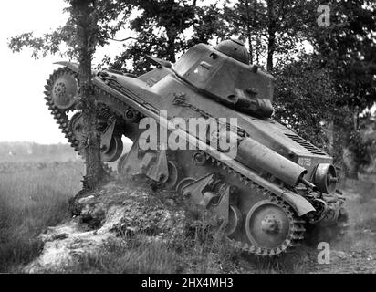 General De Gaulle's Troops in Training -- One of the tanks during the maneuvers. Manoeuvres by troops and heavy and light tanks belonging to the Army of all free Frenchmen under General de Gaulle's command, were stages before British Military experts at a camp in the Home Counties. November 5, 1940. (Photo by L.N.A.). Stock Photo