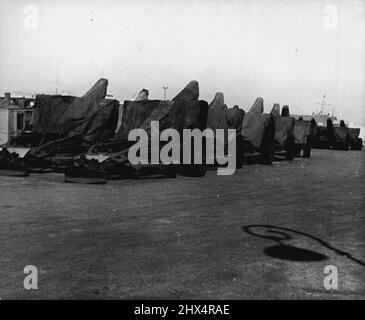 Fayid Camp: British Stronghold In Suez Canal Zone -- Covered by camouflaged canvas they stand ready to be wheeled into action. November 27, 1951. (Photo by Camera Press). Stock Photo