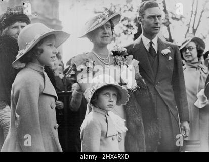 Duke of York, Heir-Presumptive to the Throne -- The Duke of York, who as brother of the King is heir-presumptive to the British Throne, photographed with the Duchess and their daughters, Princess Elizabeth and Princess Margaret Rose. Princess Elizabeth is second in the line of succession. The Duke, who made a hurried return from Scotland, has been having consultations with other members of the Royal family concerning the crisis. December 03, 1936. (Photo by Kosmos Press Bureau, Aust.). Stock Photo