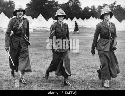 The Women's Transport Service (First Aid Nursing Yeomanry) held a pageant of 30 years, 1909 to 1939, by members of the Corps in Period Uniform at their camp at mytchett, aldershot, hants. Members of a Corps wearing Period Uniform of 1914. (In Centre) The Countees of Brecknock(Lady-in-Waiting to the Duchees of Kent), she is seen waring the Uniform of a Corporal. July 18, 1939. (Photo by Sport & General). Stock Photo
