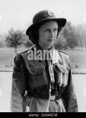 Princess Margaret Rose Who celebrates her birthday on August 21, when she will be 14 years-old. She is seen in the uniform of the Girls Guides, and is a member of the Buckingham Palace Company, who have been in camp at Royal Lodge, Windsor Park. August 15, 1944. (Photo by Studio Lisa). Stock Photo