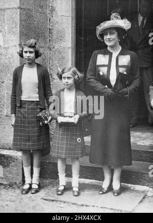 The Queen Attends Church Sale of York Near Balmoral Queen Elizabeth in a happy mood as she leaves with the two princesses after attending the sale of work. Queen Elizabeth accompanied by the little Princesses Elizabeth and Margaret yesterday attended a sale of work at Carthie Church, which is near Balmoral, where the Royal family are at present in residence. September 4, 1938. (Photo by Wide World Photo). Stock Photo