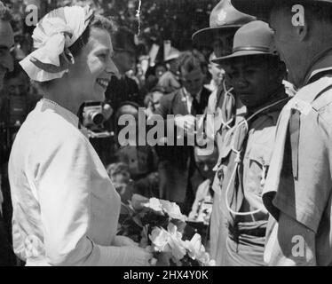 Queen at Timaru, NZ. Queen Elizabeth greeting Samoan Scouts who were in the South Island for a Jamboree. Mayor Mr. R. E. White presented the Scouts to Her Majesty. August 25, 1952. Stock Photo